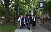 Graduates process on Kaufman Mall